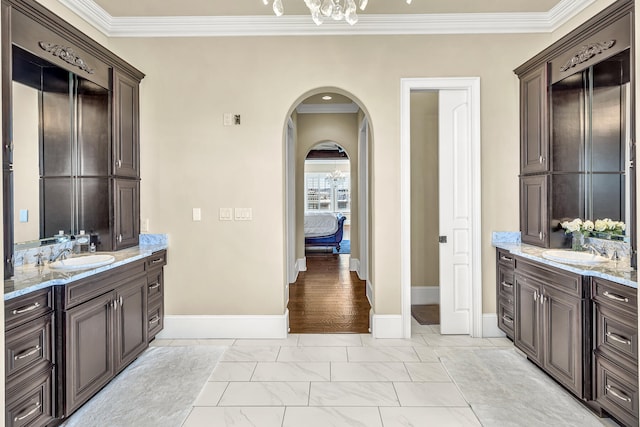24 Norriego Rd, Destin, FL 32541 - bathroom featuring tile flooring, oversized vanity, crown molding, and double sink