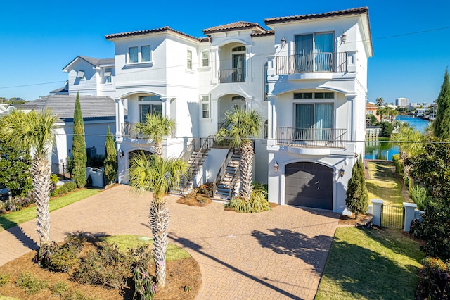 24 Norriego Rd, Destin, FL 32541 - mediterranean / spanish home with a balcony and a garage