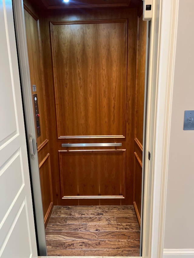 24 Norriego Rd, Destin, FL 32541 - details featuring elevator and hardwood / wood-style flooring