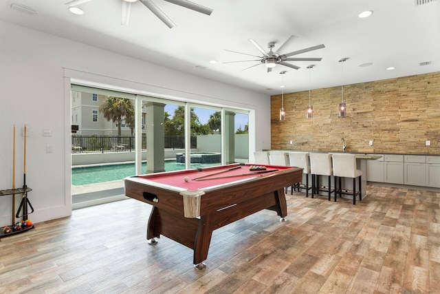 game room with billiards, ceiling fan, light hardwood / wood-style floors, and sink