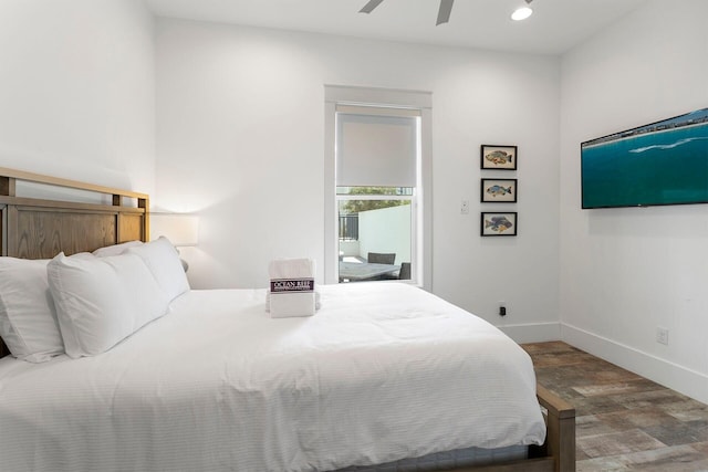 bedroom featuring ceiling fan and dark wood-type flooring