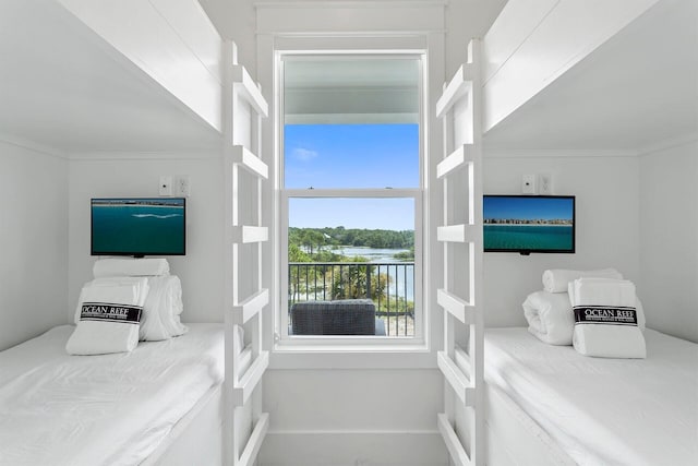 bedroom featuring crown molding