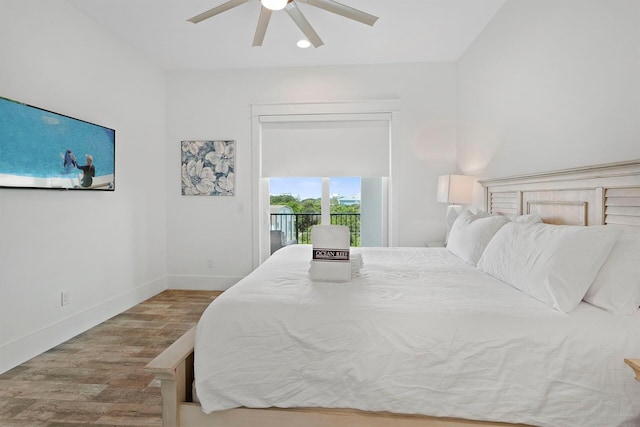 bedroom with light hardwood / wood-style floors, ceiling fan, and access to outside