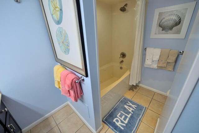 bathroom with shower / bathtub combination and tile floors