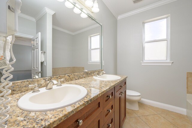 bathroom featuring tile flooring, double sink vanity, ornamental molding, and toilet