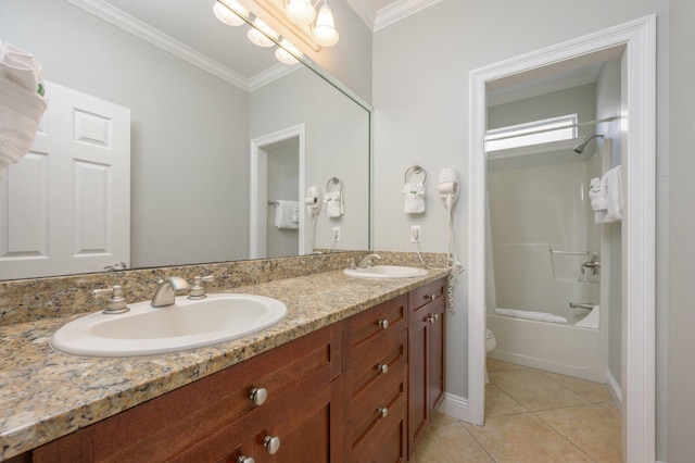 full bathroom featuring vanity with extensive cabinet space, tile floors, bathtub / shower combination, dual sinks, and toilet