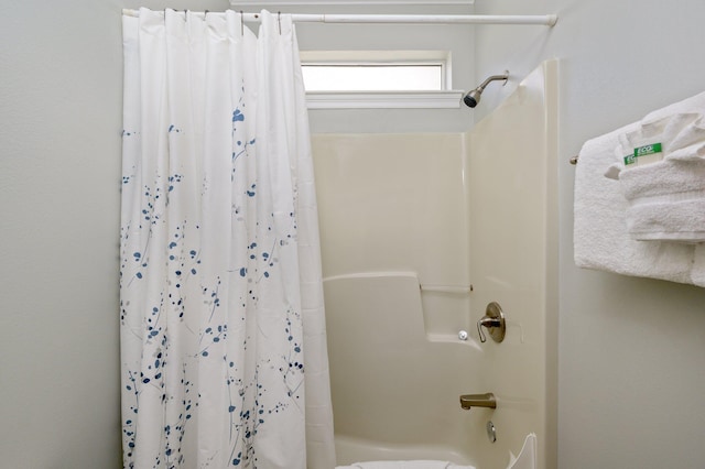 bathroom featuring shower / bath combo