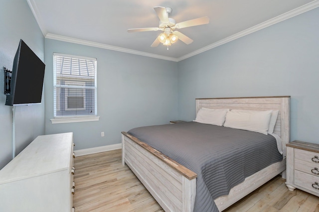 bedroom featuring ceiling fan, crown molding, and light wood-type flooring