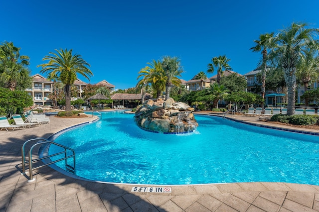 view of swimming pool with a patio