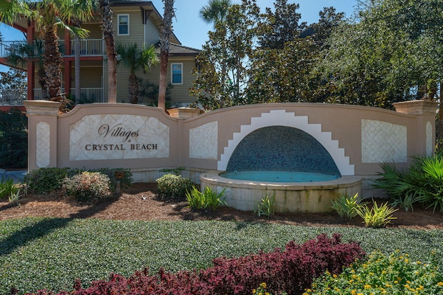 view of community sign