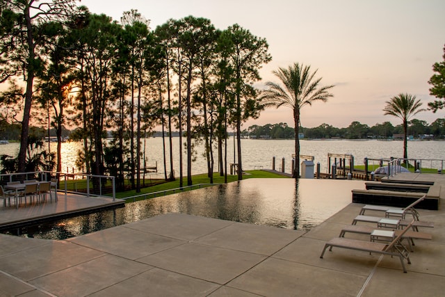 view of home's community with a water view