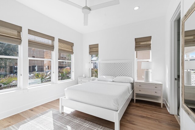 bedroom featuring hardwood / wood-style floors and ceiling fan