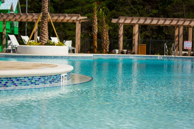 view of pool with a pergola