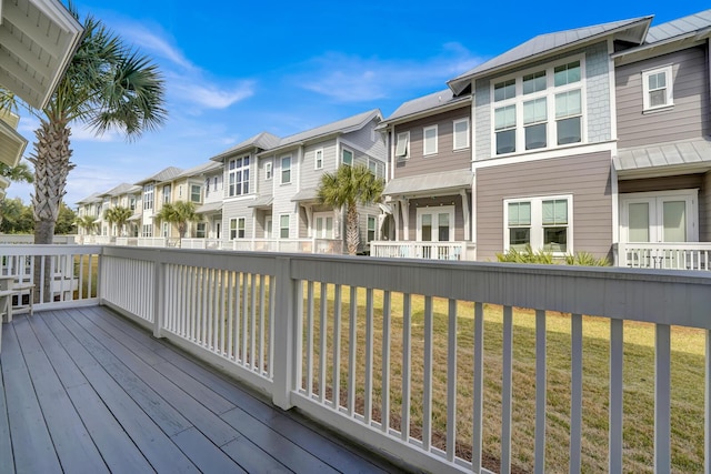 deck featuring a yard