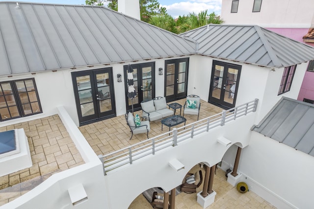 exterior space featuring french doors and a patio area