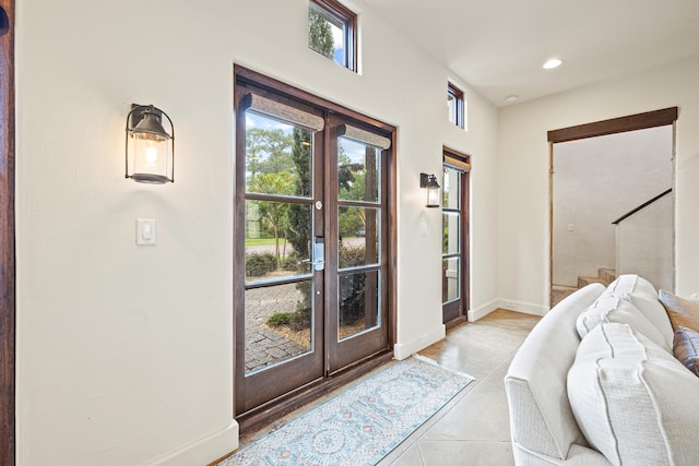 tiled foyer entrance with french doors