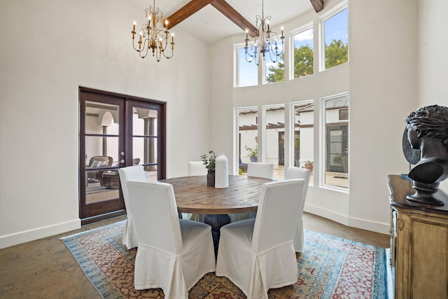 dining space featuring beamed ceiling, french doors, a chandelier, and a high ceiling