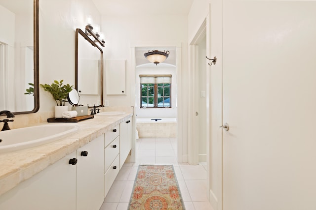 bathroom featuring double vanity and tile floors