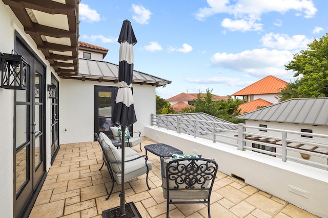 view of patio / terrace featuring a balcony