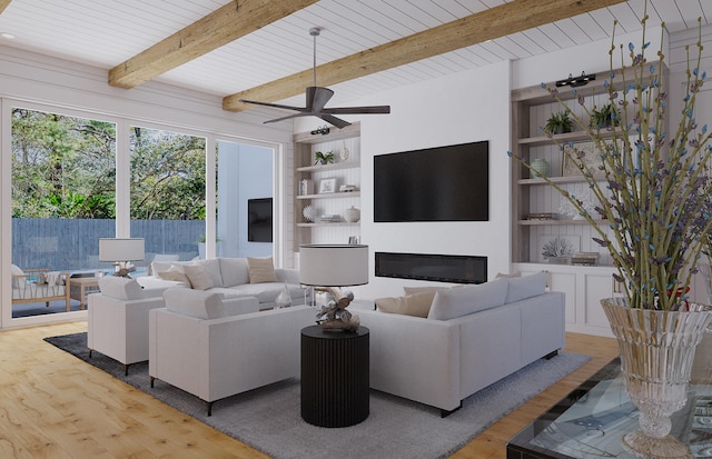 living room with light hardwood / wood-style flooring, beam ceiling, ceiling fan, and built in shelves