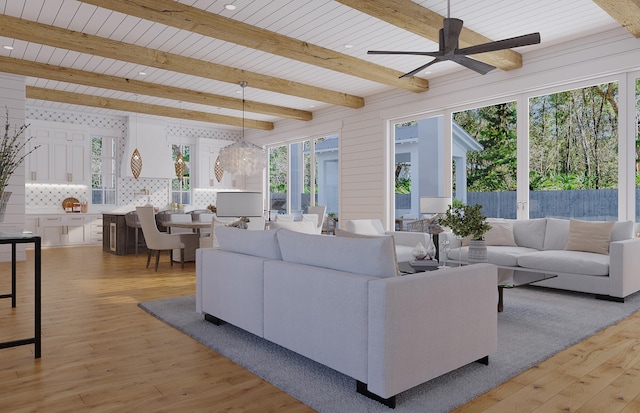 living room featuring beam ceiling, ceiling fan, and light hardwood / wood-style floors