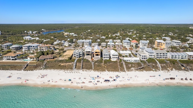 aerial view featuring a water view and a beach view