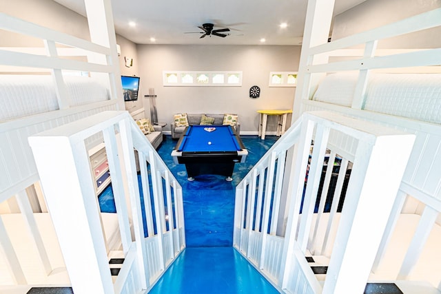 interior space featuring ceiling fan and pool table