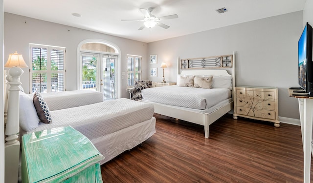 bedroom featuring dark wood-type flooring, ceiling fan, access to exterior, and french doors