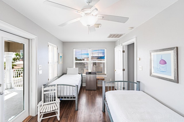 bedroom with ceiling fan, access to exterior, and dark hardwood / wood-style floors