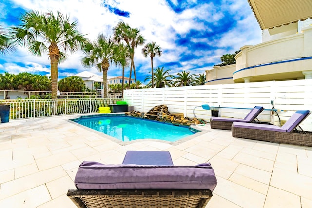 view of pool featuring a patio area