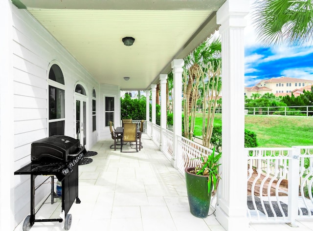 view of patio / terrace featuring a porch and area for grilling