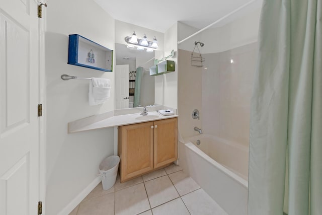 bathroom featuring vanity with extensive cabinet space, tile flooring, and shower / tub combo with curtain