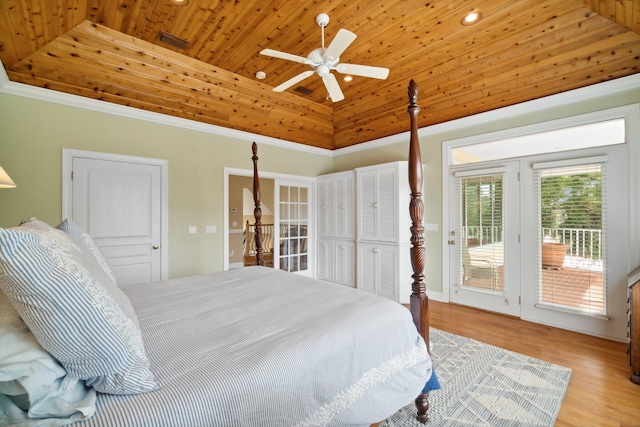 bedroom featuring ceiling fan, light hardwood / wood-style floors, access to exterior, crown molding, and wooden ceiling