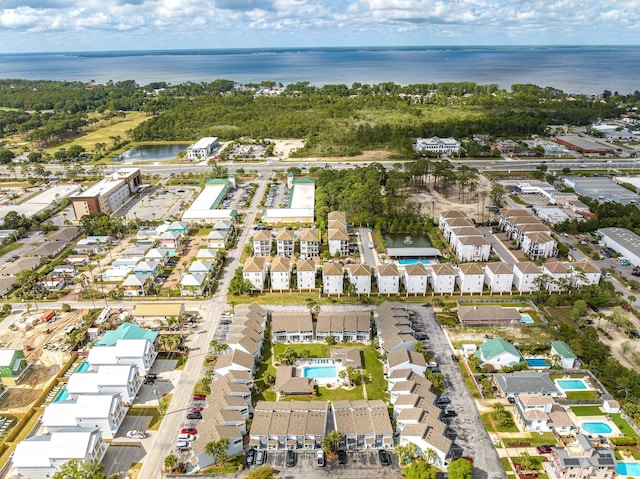 drone / aerial view with a water view