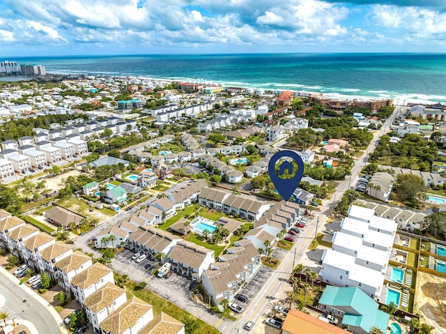 drone / aerial view with a water view