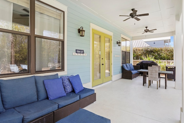 view of patio featuring ceiling fan