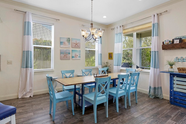 dining area featuring an inviting chandelier, dark wood-type flooring, and crown molding