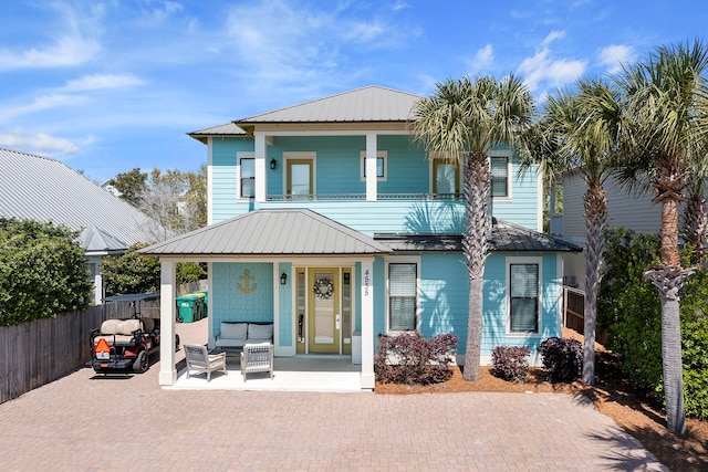 view of front of house featuring covered porch and outdoor lounge area