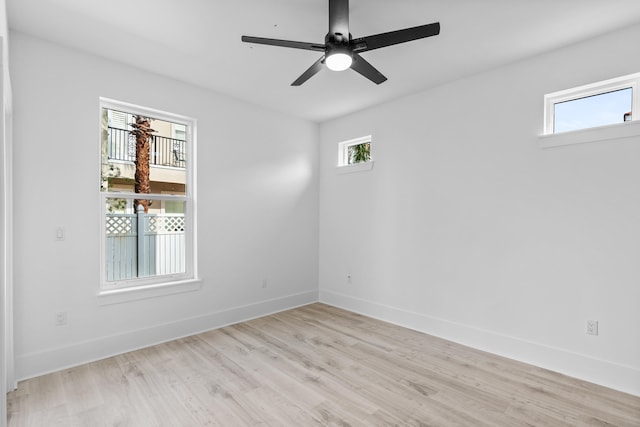 unfurnished room featuring light hardwood / wood-style flooring and ceiling fan