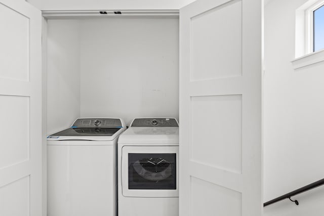 laundry room featuring independent washer and dryer