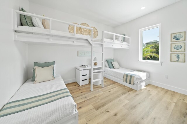 bedroom with light hardwood / wood-style floors