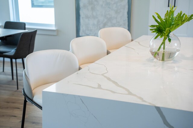 dining area with hardwood / wood-style flooring