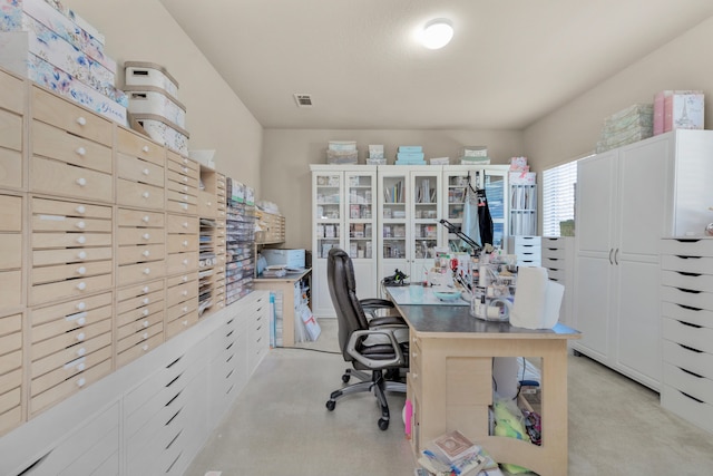 office area featuring light colored carpet