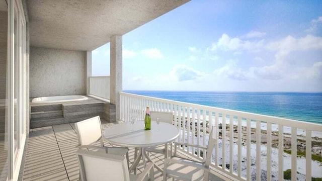 balcony with a beach view and a water view