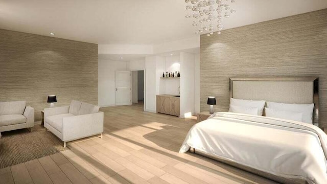 bedroom with light hardwood / wood-style floors and an inviting chandelier