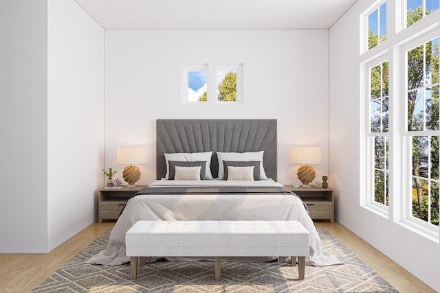 bedroom with light hardwood / wood-style floors