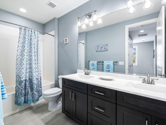 full bathroom with dual bowl vanity, shower / bath combination with curtain, tile floors, and toilet