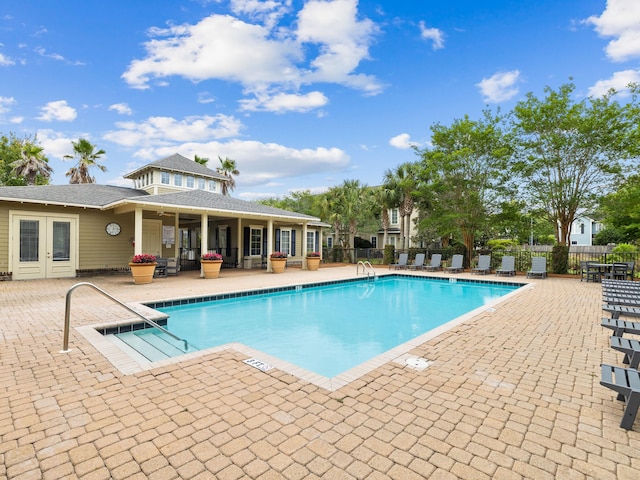 view of pool featuring a patio