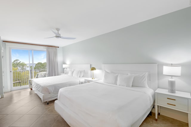 tiled bedroom with ceiling fan and access to exterior