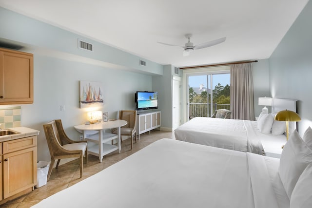 tiled bedroom featuring ceiling fan and access to exterior